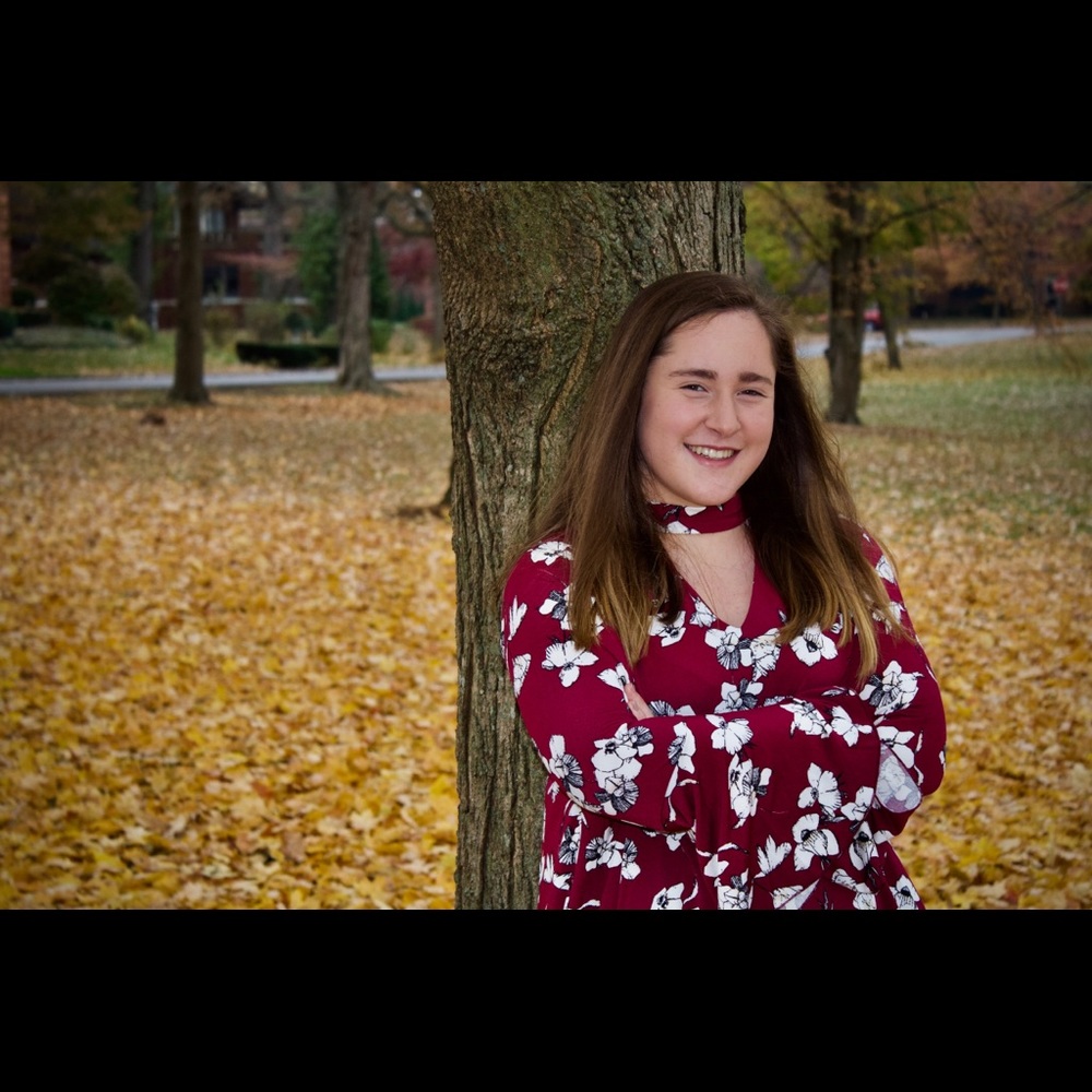 Long sleeve floral maroon blouse.